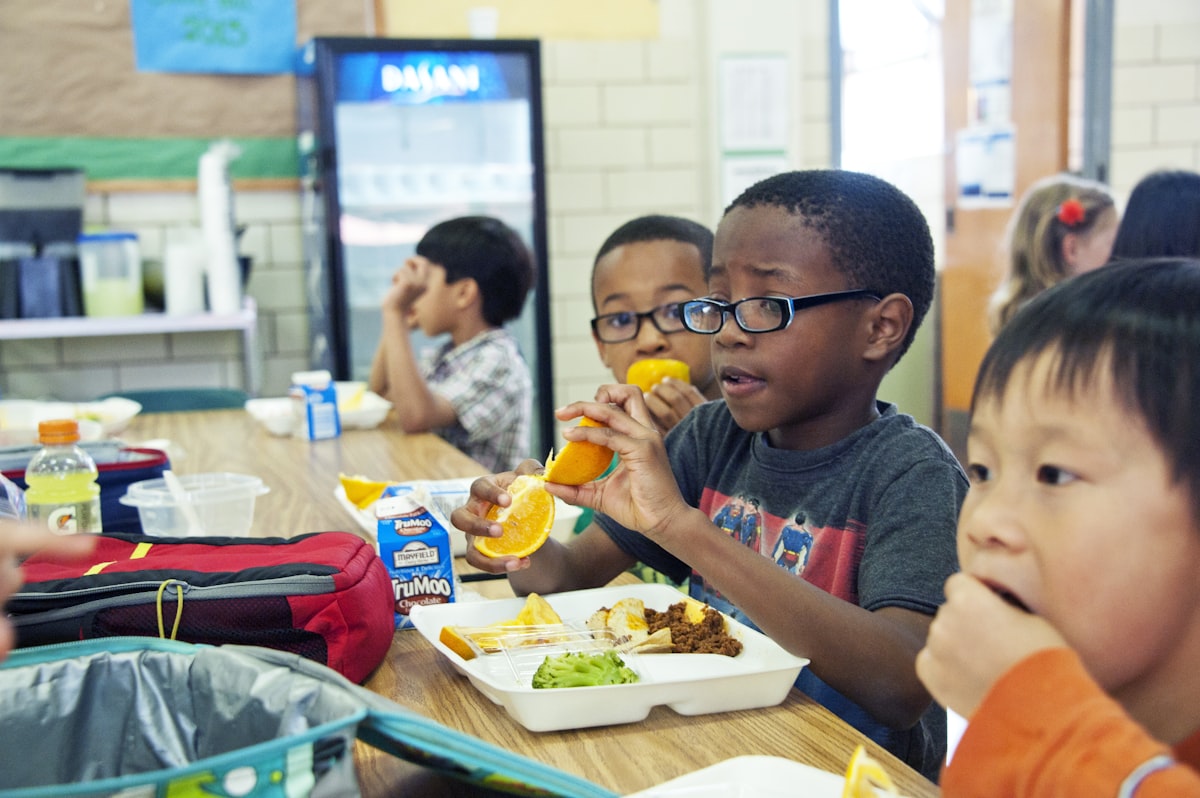 Healthy children enjoying nutritious meals together